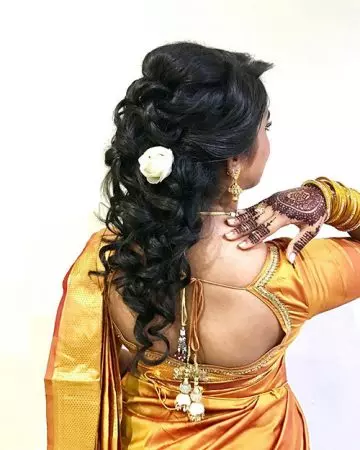 Half up curls hairstyle to complement your saree