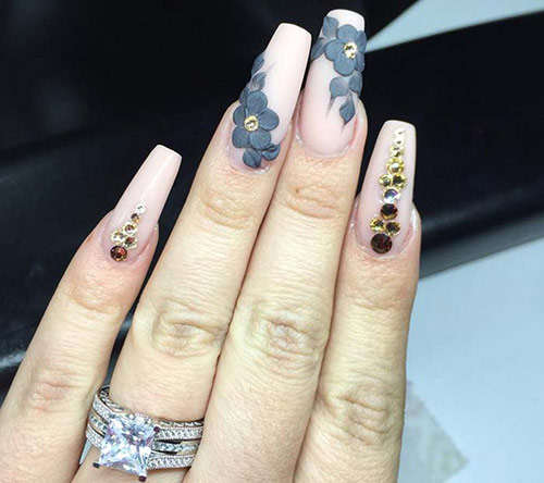 Intricate floral pattern acrylic nail design