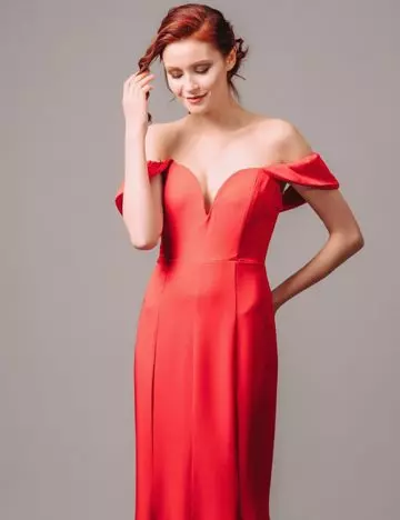 Pretty girl in off-shoulder cocktail dress