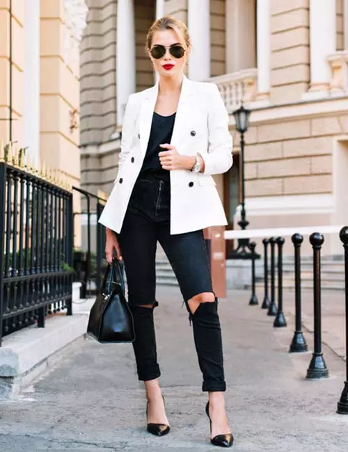 Distressed black jeans with a blazer