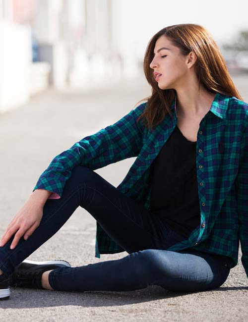 Black jeans with a checkered shirt