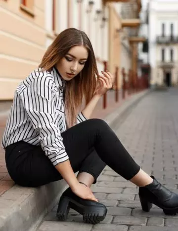 Black jeans with black and white striped shirt
