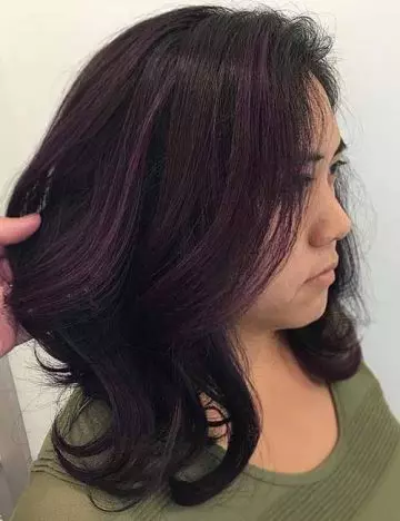 Subtle purple highlights for dark hair