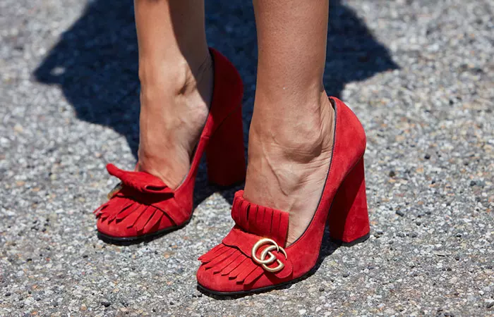 Red heels from Gucci, an expensive shoe brand