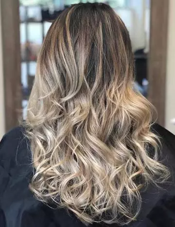 Ash blonde highlights and balayage combine to create contrast and depth