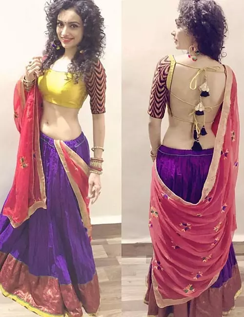 Backless blouse design with doris for lehengas and half-sarees