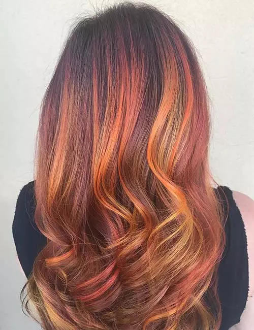 Peach and dusty pink highlights for dark brown hair