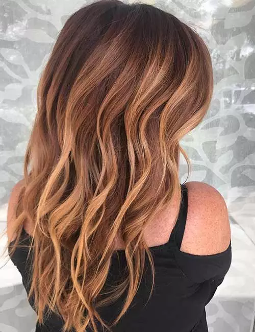 Warm chestnut balayage hair color idea for brown to blonde hair