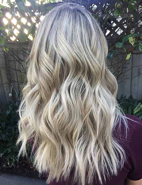 Pale ash blonde highlights add great texture for wavy hair