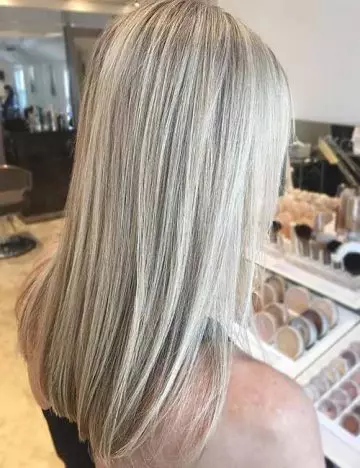 Contrast created by ash blonde highlights add dimension to fine hair