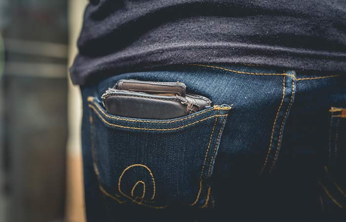 8. Posture Problem Due To Wallet Tucked Into Your Back Pocket