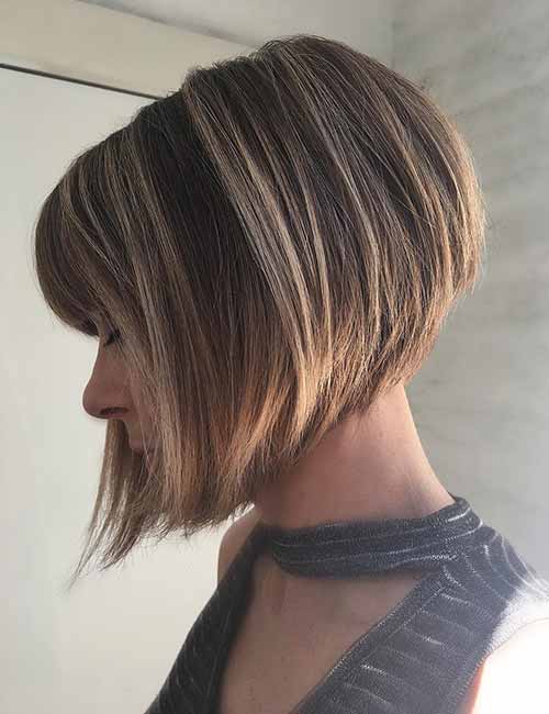 Heavy bob cut ash brown hair perfectly streaked with ash blonde highlights