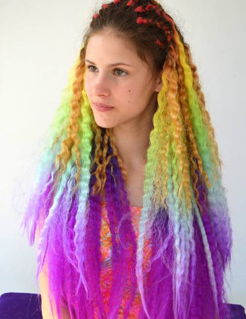 A model flaunts rainbow bright hair