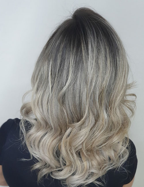 Back view of ashy mushroom blonde hairstyle
