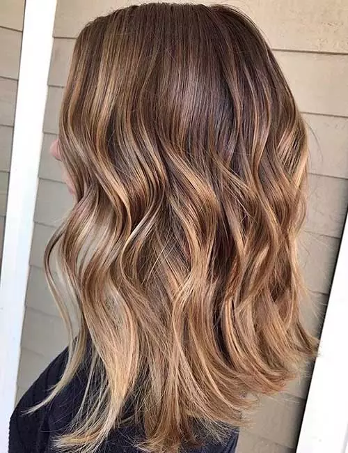 Dark to light brown balayage hair color for a charming look