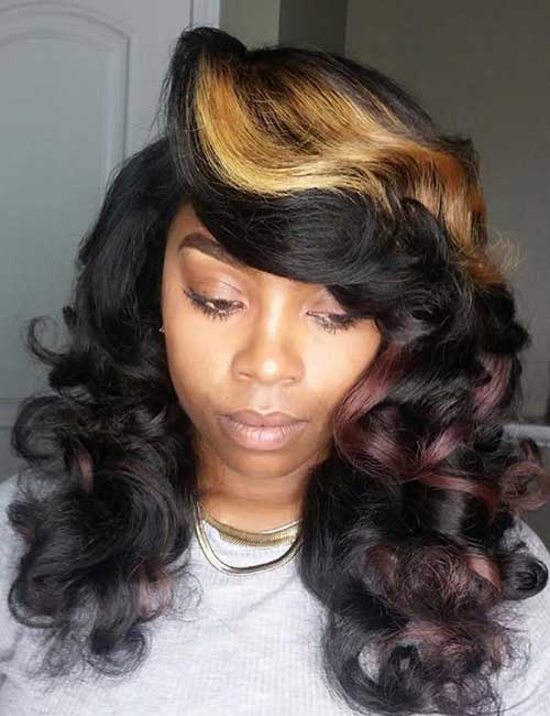Blonde and auburn highlighted curls sew-in hair