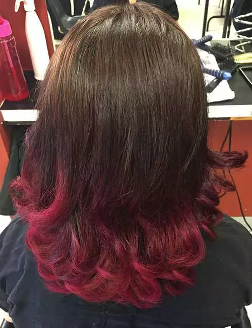 Cherry pink ombre hair color on dark hair