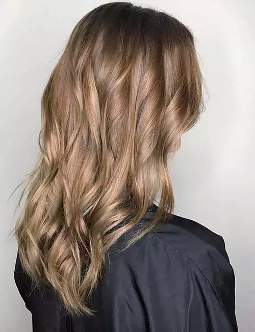 Fall-inspired light brown hair color for a charming look
