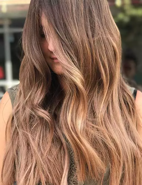 Light brown with subtle balayage hair color for a sun-kissed look