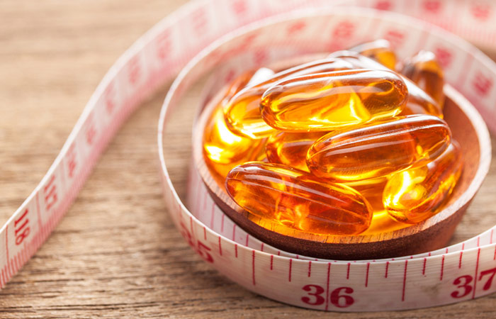 Fish oil pills aid weight loss in many ways