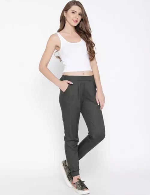 Grey joggers with white vest monochrome look