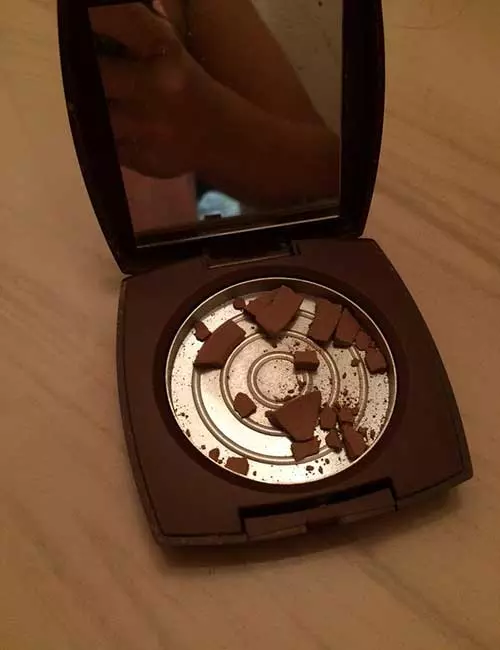 1. Heartbreak is an empty compact powder case.