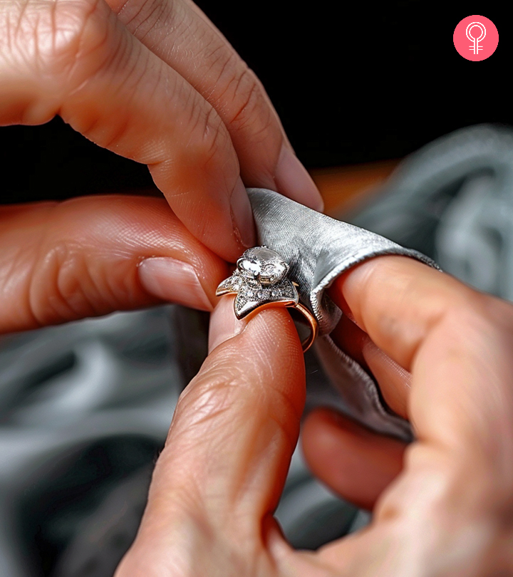 woman cleaning her jewellery