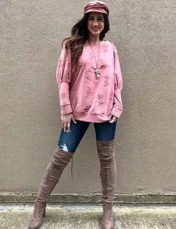 Knee high boots with denims and an oversized sweater
