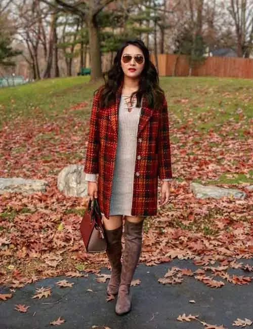 Knee high boots with a long checkered jacket
