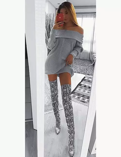 Knee high boots with an off-shoulder sweater dress
