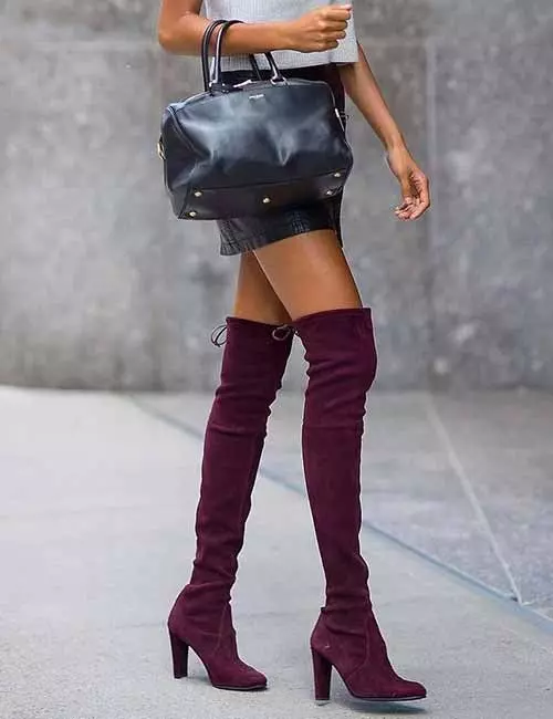 Suede knee high boots with a mini skirt