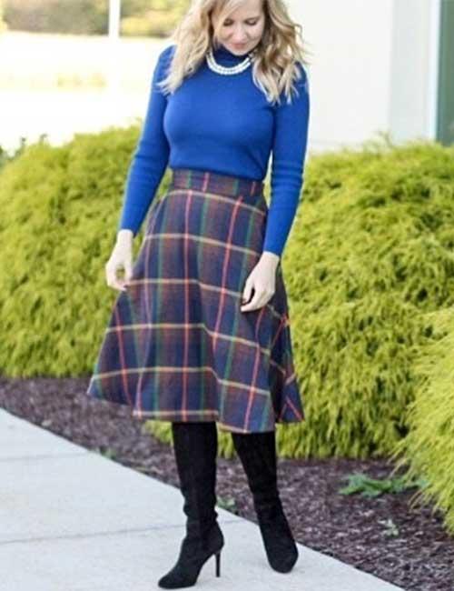 Knee high boots with an A-line skirt