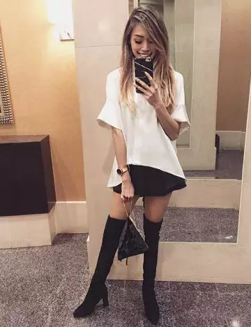 Knee high boots with an evening outfit
