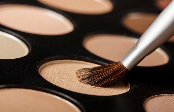 Use eyeshadow for root touch to blend your hair color