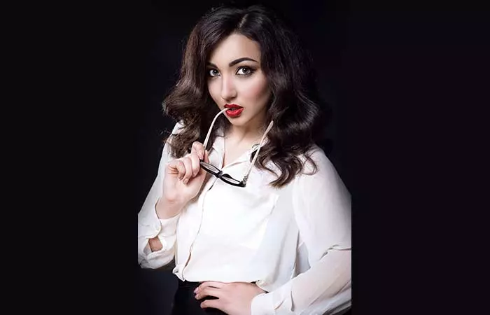 3. Chewing On The Temple Tips Of Reading Glasses