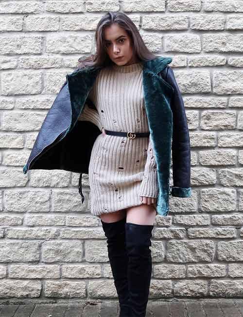 long sweater with knee high boots