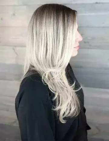 All over platinum blonde balayage hair color