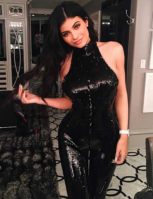 Best Kylie Jenner outfit in a black sparkly jumpsuit