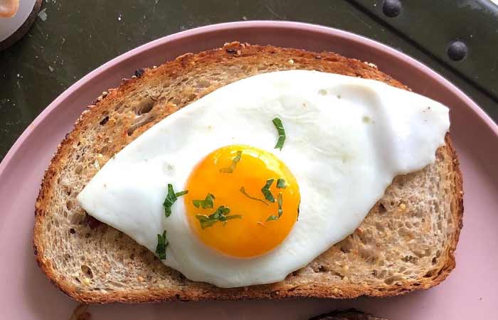 Healthy Breakfast - Sunny Side Up And Garlic Toast And Banana