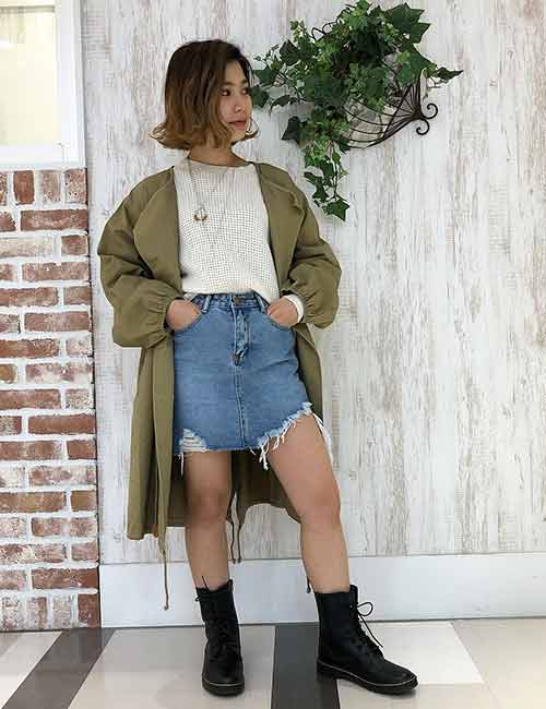 Denim skirt with an overcoat and combat boots