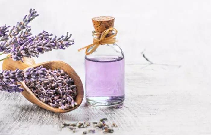 Lavender essential oil in a glass bottle