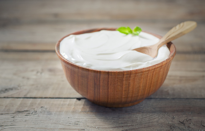 Yogurt in a wooden bowl