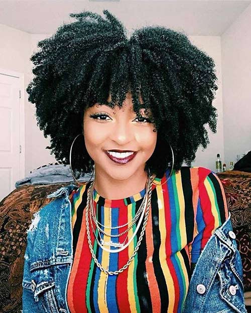 Afro kinky curly hairstyle with bangs
