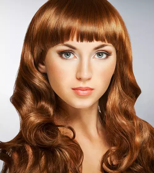 Curled-in hairstyle with bangs