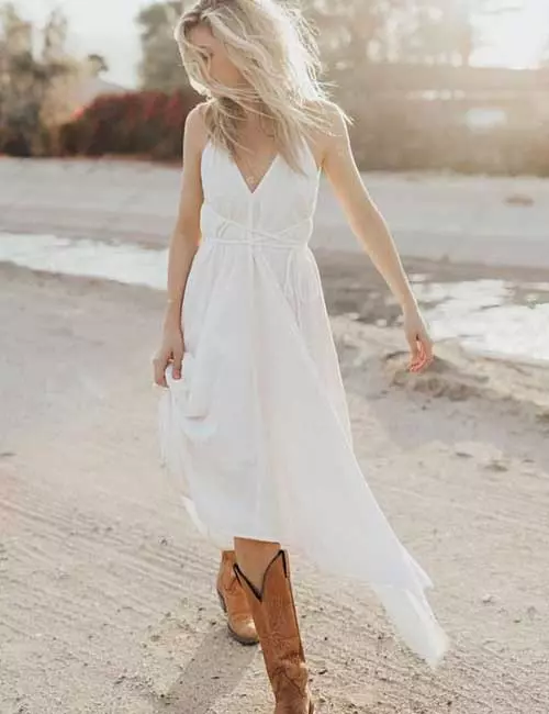 Asymmetrical dress with cowboy boots
