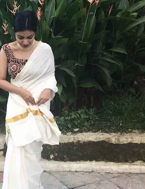 Pair your Kerala saree with sleeveless kalamkari blouse