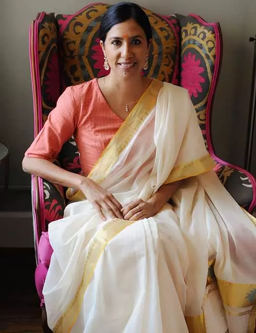 Pair Kerala saree with gamcha style blouse