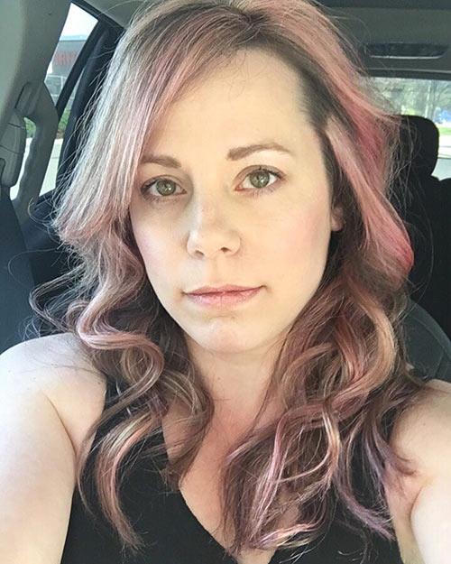 Curly hairstyle with side bangs