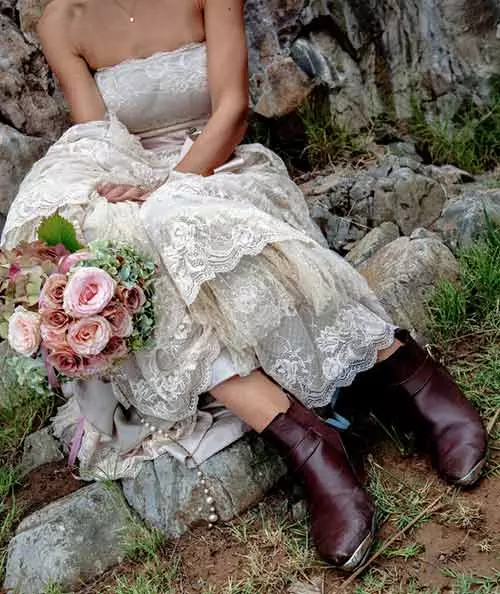 Strapless lace dress and cowboy boots