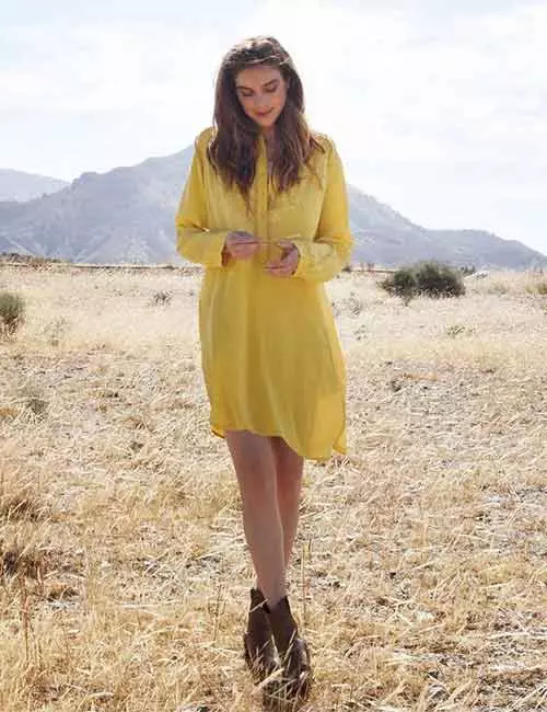 Yellow dress and cowboy boots
